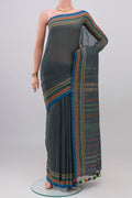 Blue Grey Cotton Saree with Thread Butta on the body and Thread Border.  displayed on a mannequin