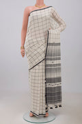White Bengal Cotton Saree with Checked design on the body and Plain Border.  displayed on a mannequin