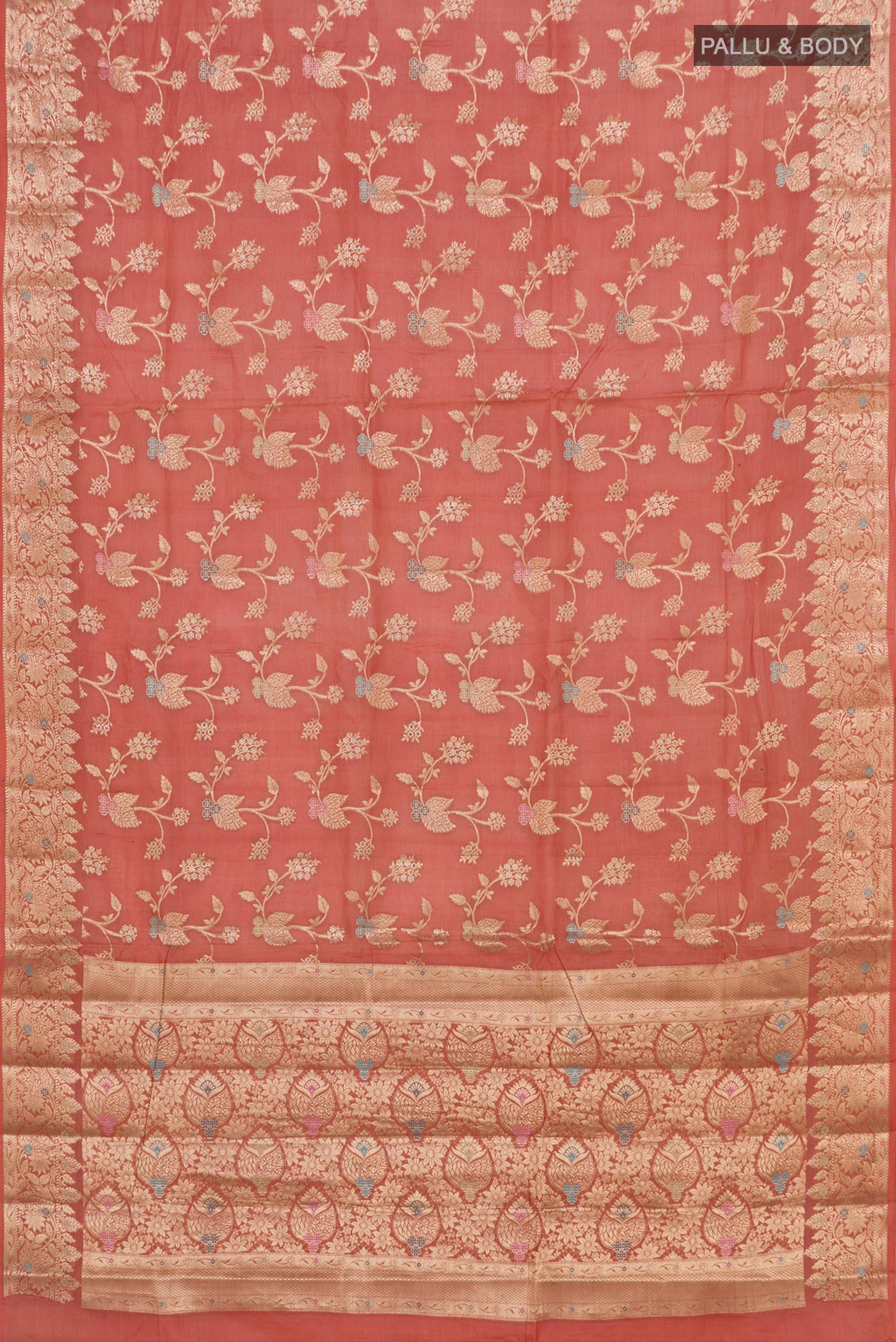 Flat view of Peach Tussar Silk Saree with Fancy on the body and Zari Border. 