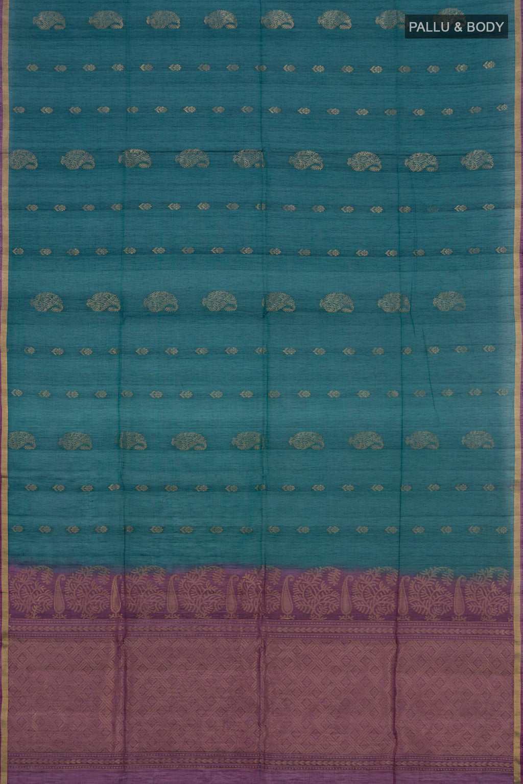 Flat view of Peacock Blue Silk Cotton Saree with Zari Butta on the body and Thin Zari Line. 