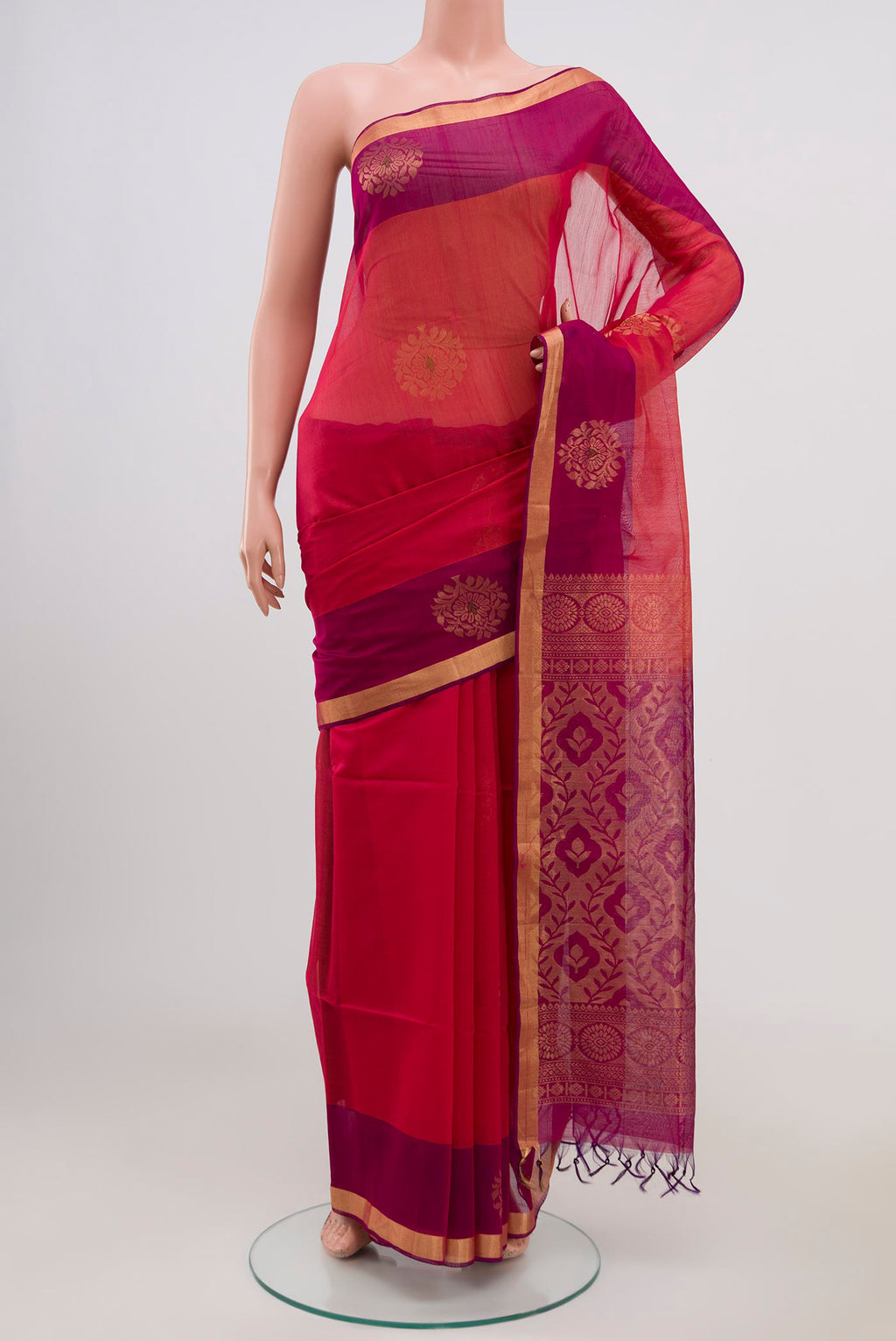 Pink Coimbatore Silk Cotton Saree with Zari Butta on the body and Thin Zari Line.  displayed on a mannequin