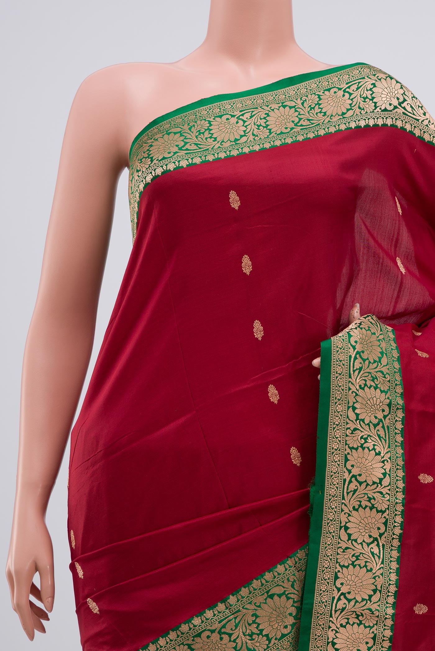 Border image of Maroon Banarasi Katan Silk Saree with Zari Butta on the body and Zari Border. 