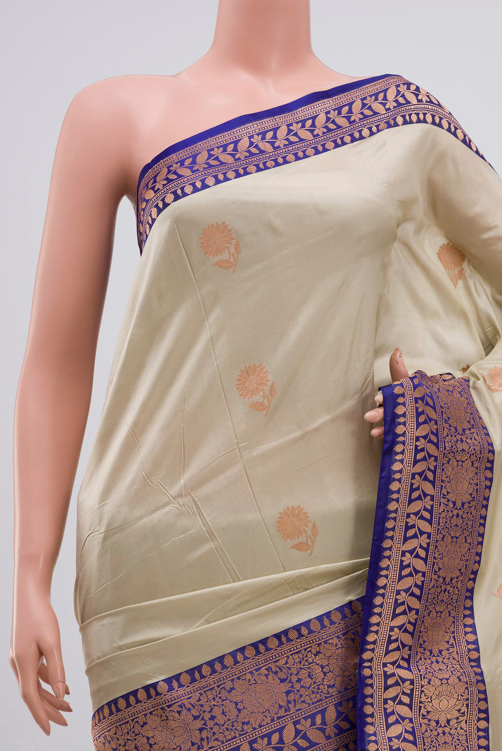 Border image of Cream Banarasi Katan Silk Saree with Zari Butta on the body and Zari Border. 