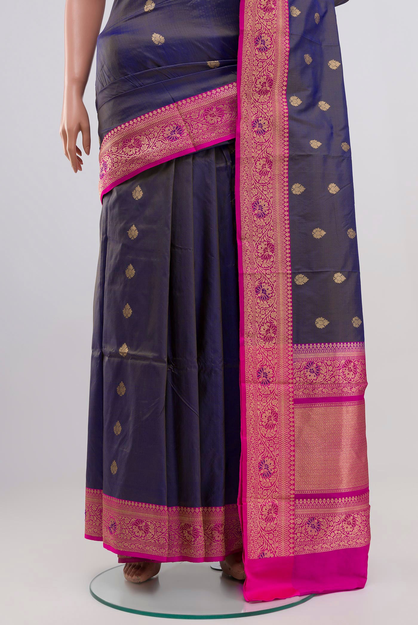 Pleats and pallu of Blue Grey Banarasi Katan Silk Saree with Zari Butta on the body and Zari Border. 