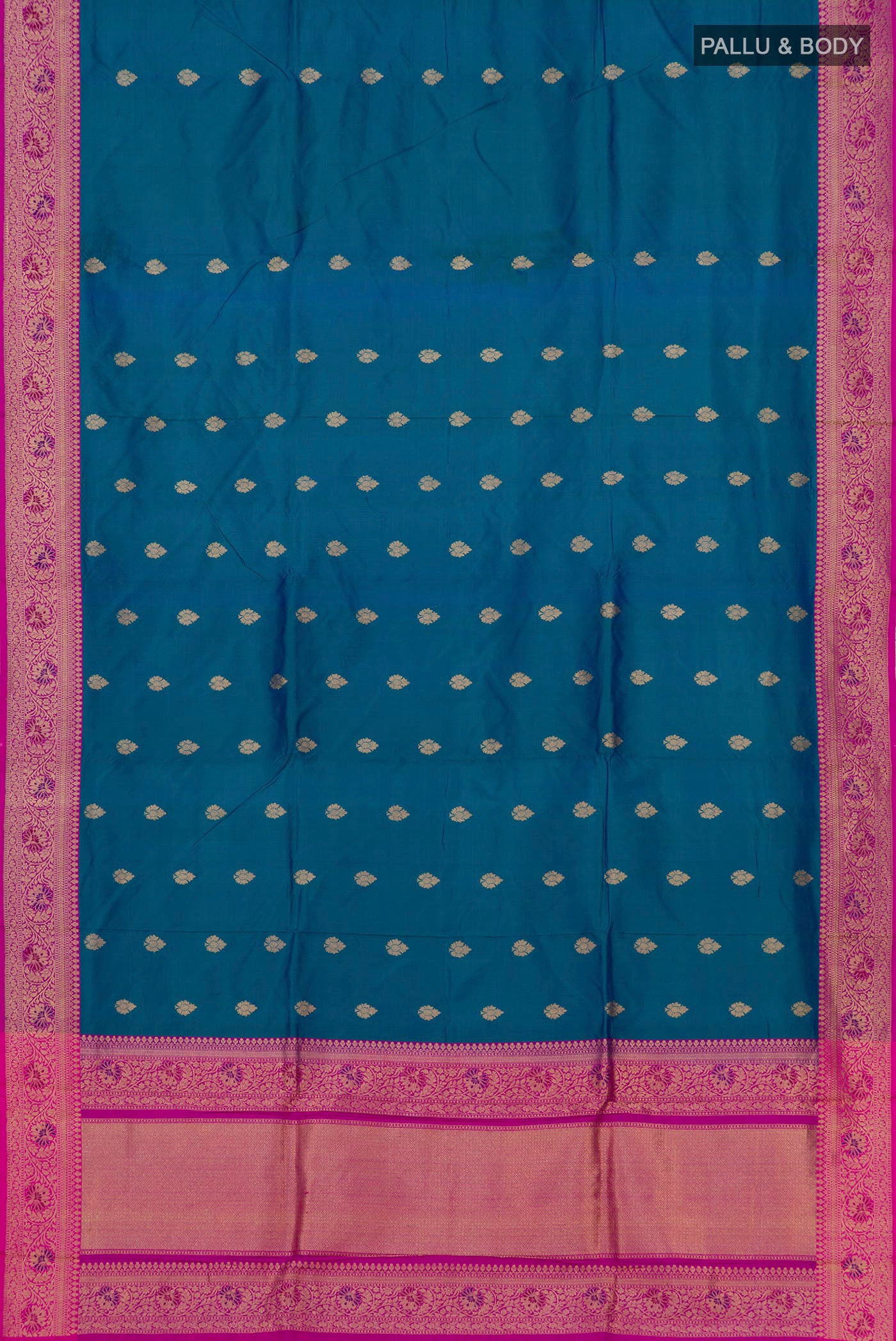 Flat view of Blue Banarasi Katan Silk Saree with Zari Butta on the body and Zari Border. 