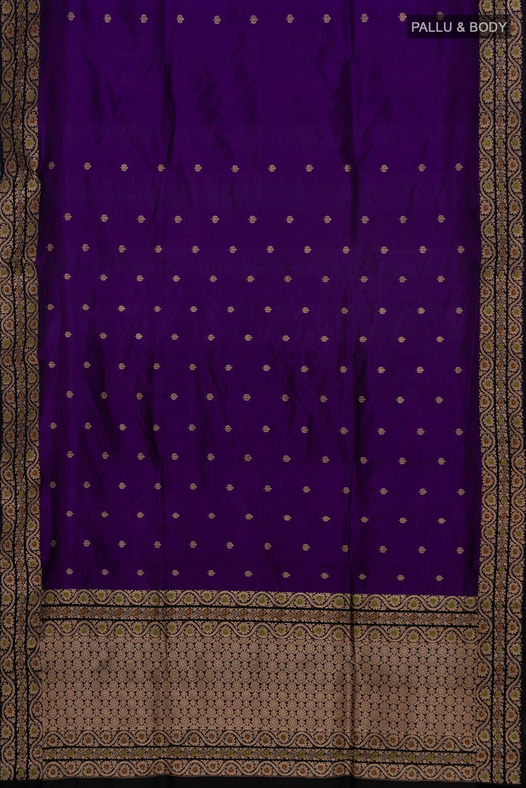 Flat view of Violet Banarasi Katan Silk Saree with Zari Butta on the body and Zari Border. 