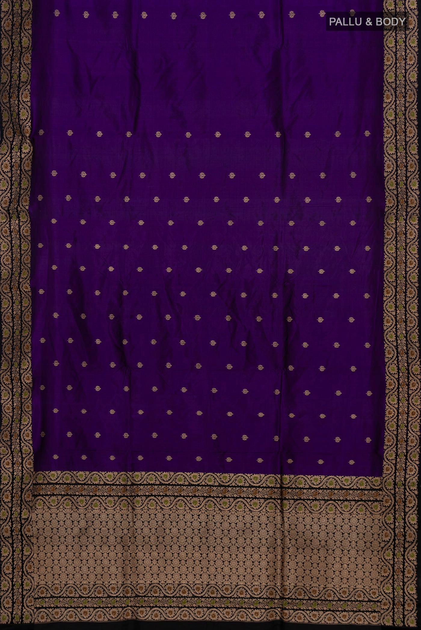 Flat view of Violet Banarasi Katan Silk Saree with Zari Butta on the body and Zari Border. 
