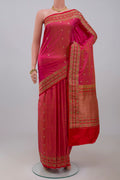 Pink Banarasi Katan Silk Saree with Zari Butta on the body and Fancy Border.  displayed on a mannequin