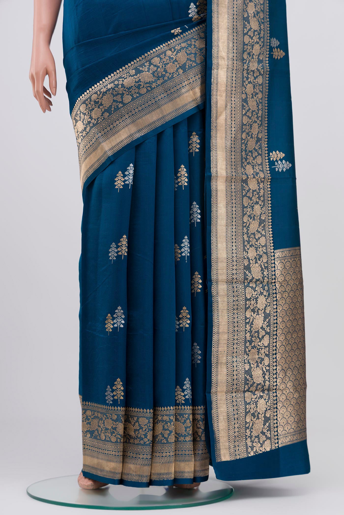 Pleats and pallu of Blue Banarasi Katan Silk Saree with Zari Butta on the body and Zari Border. 