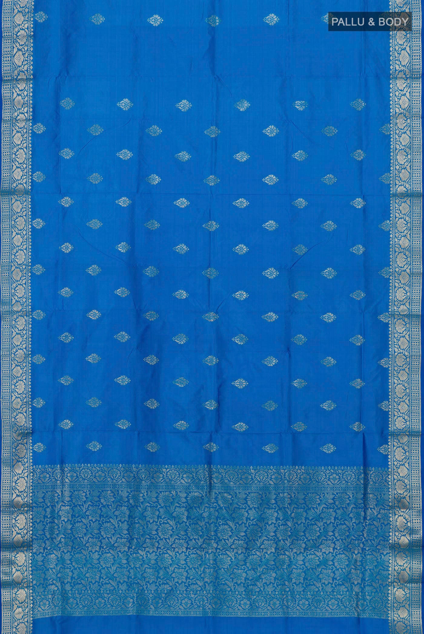 Flat view of Royal Blue Banarasi Katan Silk Saree with Zari Butta on the body and Zari Border. 
