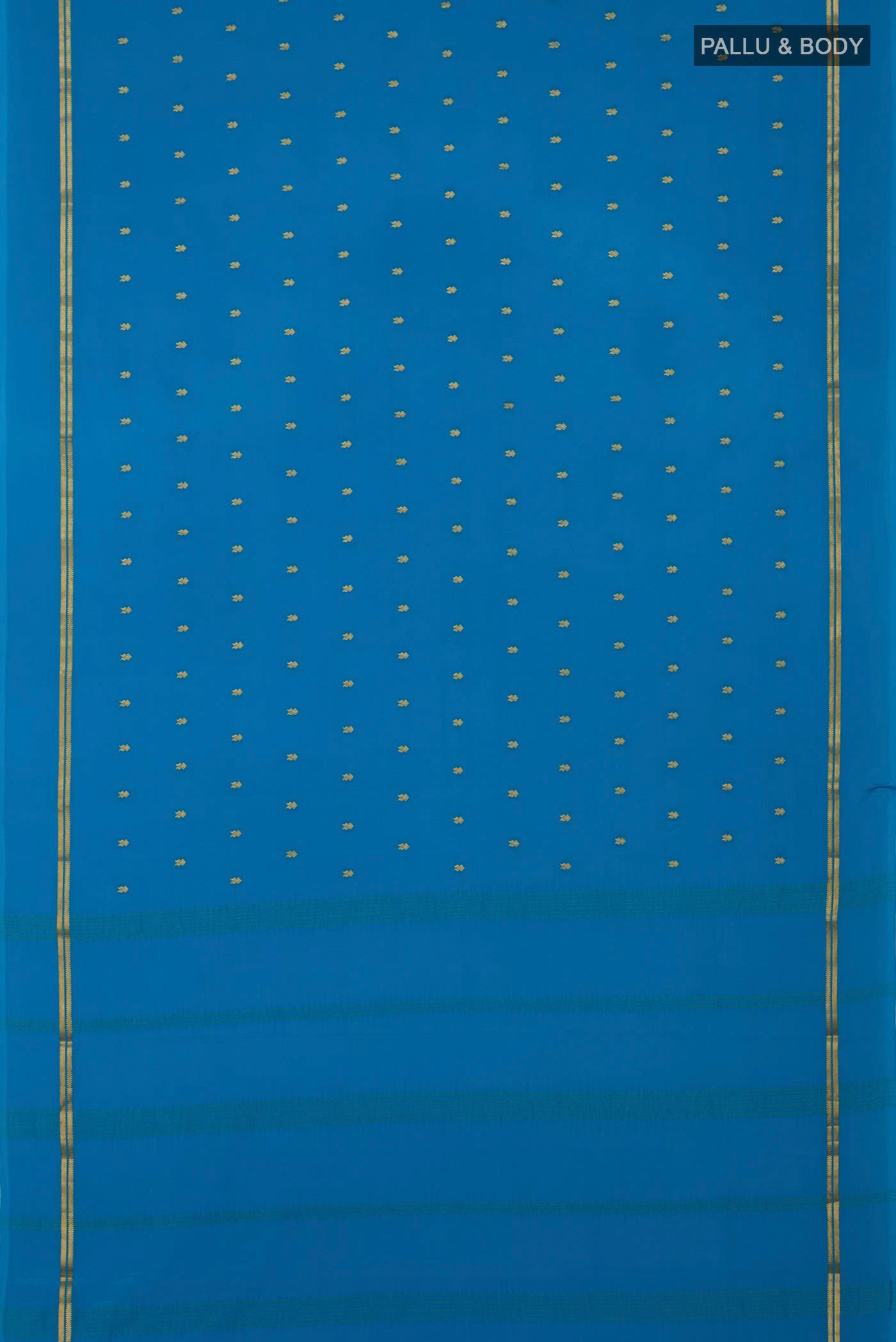 Flat view of Blue Mysore Crepe Saree with Zari Butta on the body and Plain Border. 