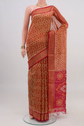 Beige Silk Cotton Saree with Ikat design on the body and Zari Border.  displayed on a mannequin