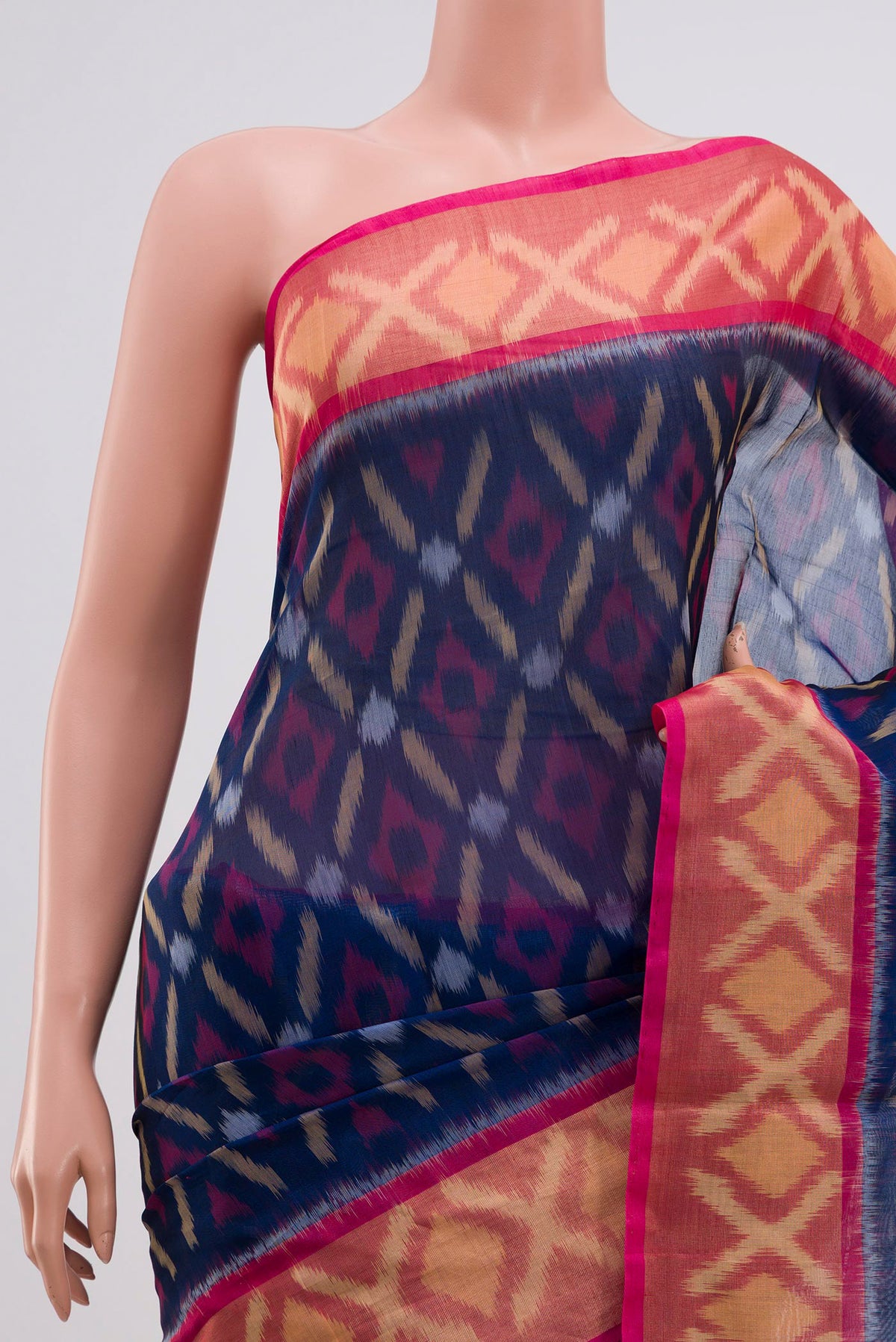 Border image of Navy Blue Coimbatore Silk Cotton Saree with Ikat Print on the body and Zari Border. 