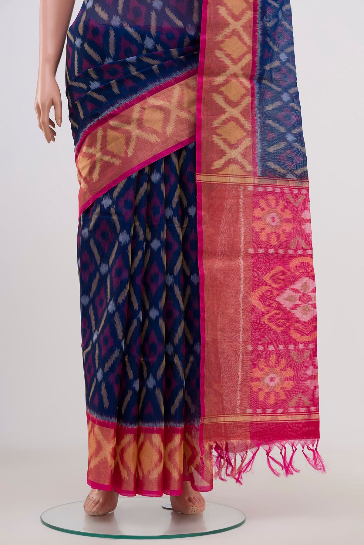 Pleats and pallu of Navy Blue Coimbatore Silk Cotton Saree with Ikat Print on the body and Zari Border. 