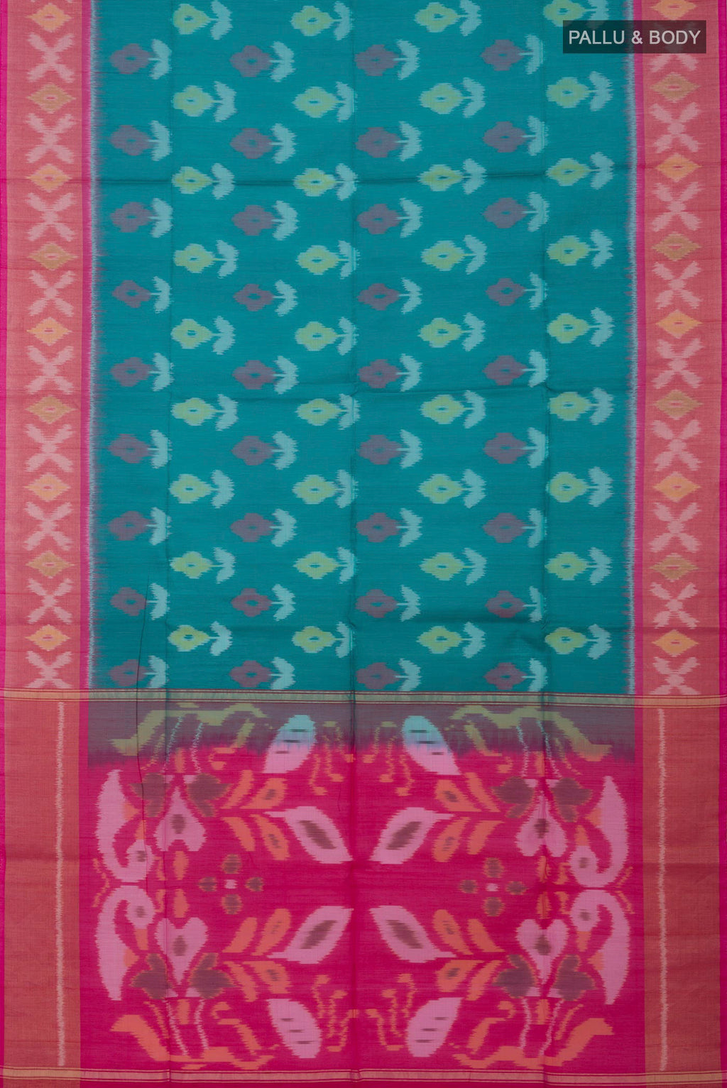 Flat view of Green Silk Cotton Saree with Ikat design on the body and Zari Border. 