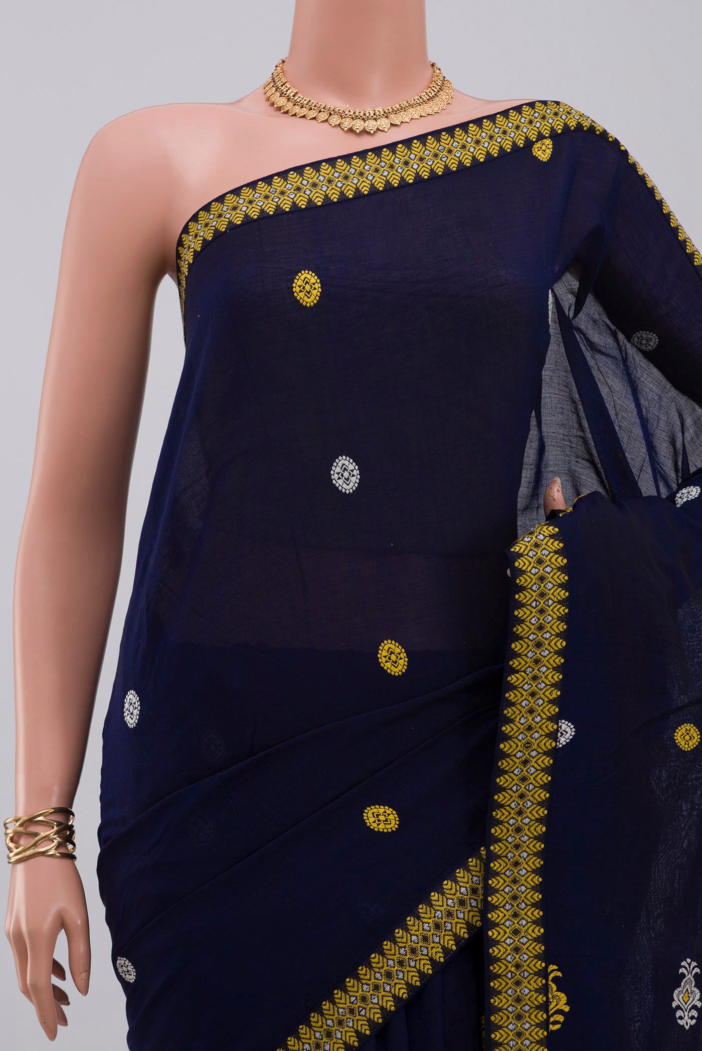Border image of Blue Assam Cotton Saree with Thread Butta on the body and Thread Border. 