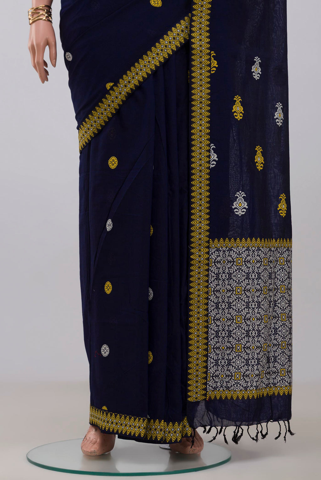 Pleats and pallu of Blue Assam Cotton Saree with Thread Butta on the body and Thread Border. 