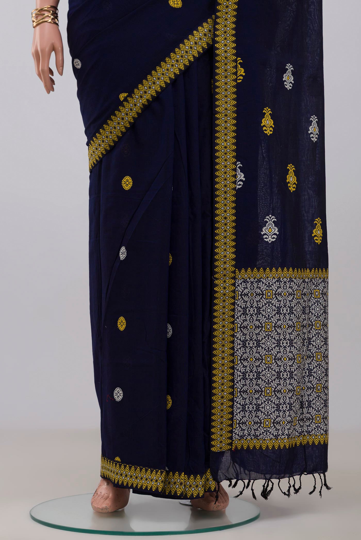 Pleats and pallu of Blue Assam Cotton Saree with Thread Butta on the body and Thread Border. 