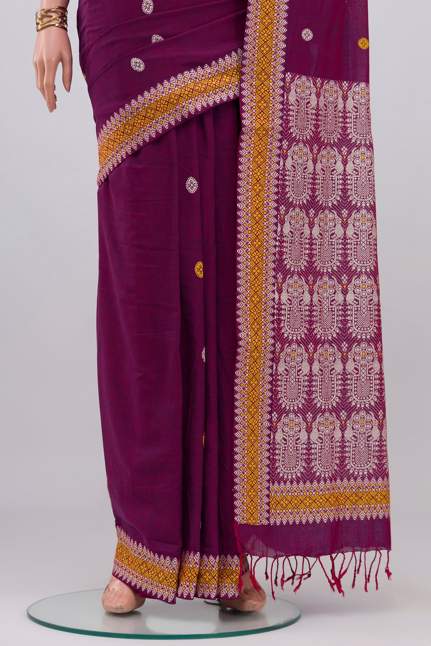 Pleats and pallu of Purple Assam Cotton Saree with Thread Butta on the body and Thread Border. 