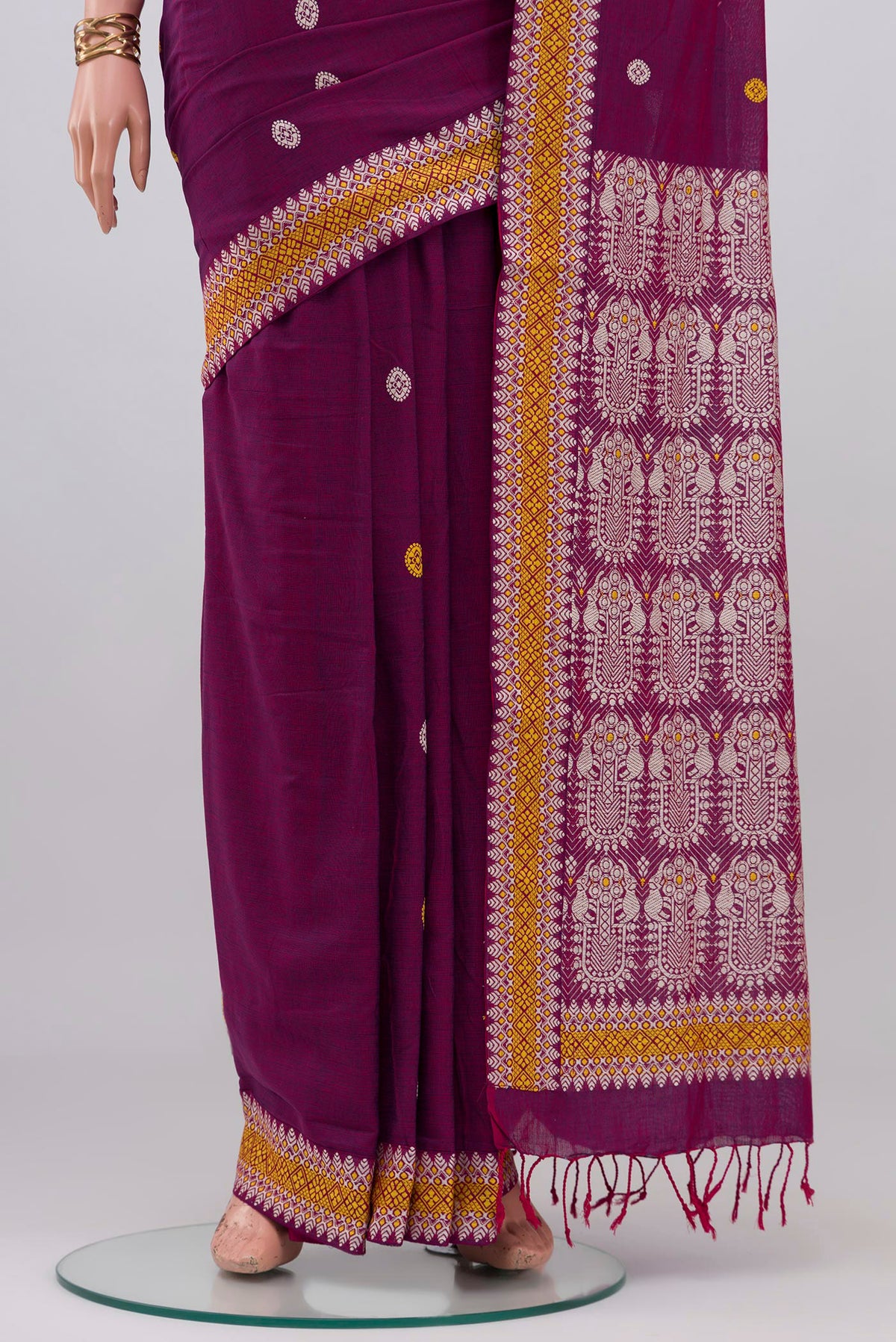 Pleats and pallu of Purple Assam Cotton Saree with Thread Butta on the body and Thread Border. 