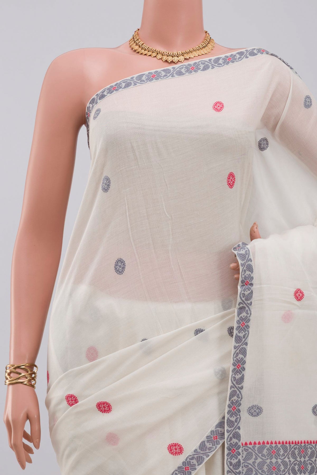 Border image of White Assam Cotton Saree with Thread Butta on the body and Thread Border. 
