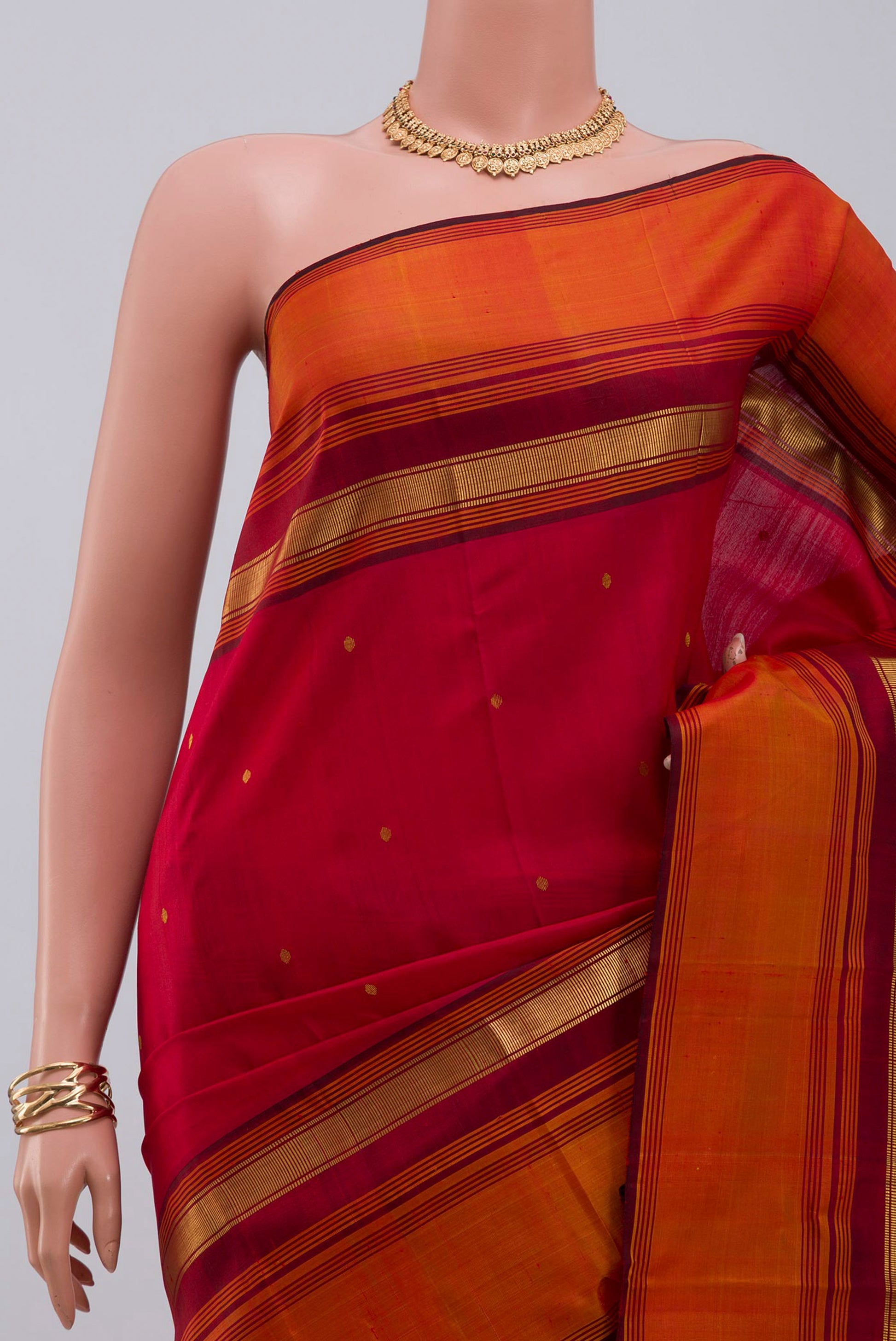 Border image of Pure Silk Pure Zari Maroon Kanchipuram Saree with Zari Butta on the body and Zari Border. 