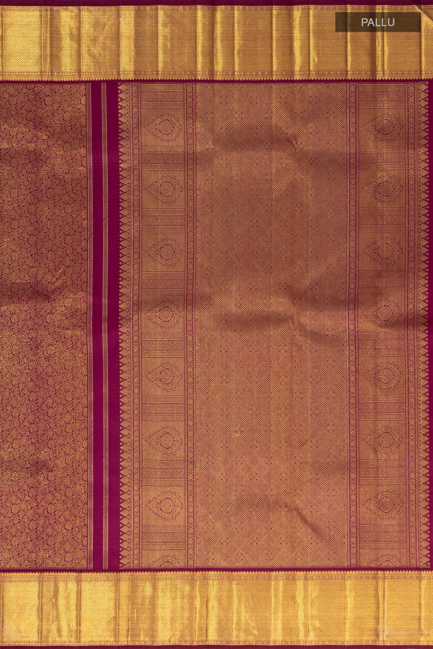 Close up image of the pallu of Purple Kanchipuram Saree with Zari Brocade on the body and Zari Border. 