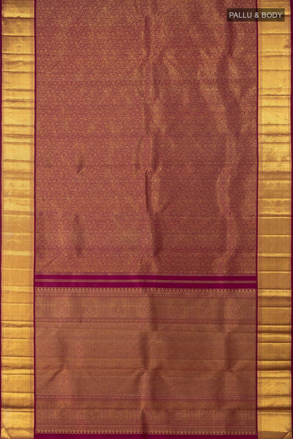 Flat view of Purple Kanchipuram Saree with Zari Brocade on the body and Zari Border. 