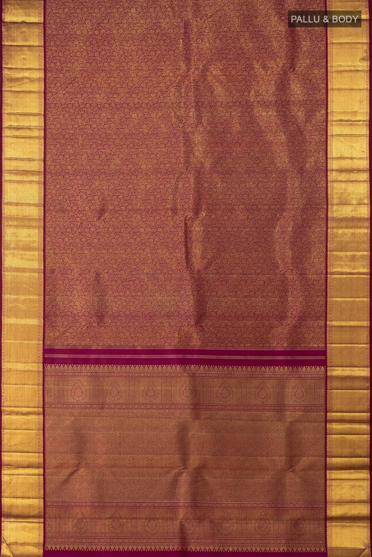 Flat view of Purple Kanchipuram Saree with Zari Brocade on the body and Zari Border. 