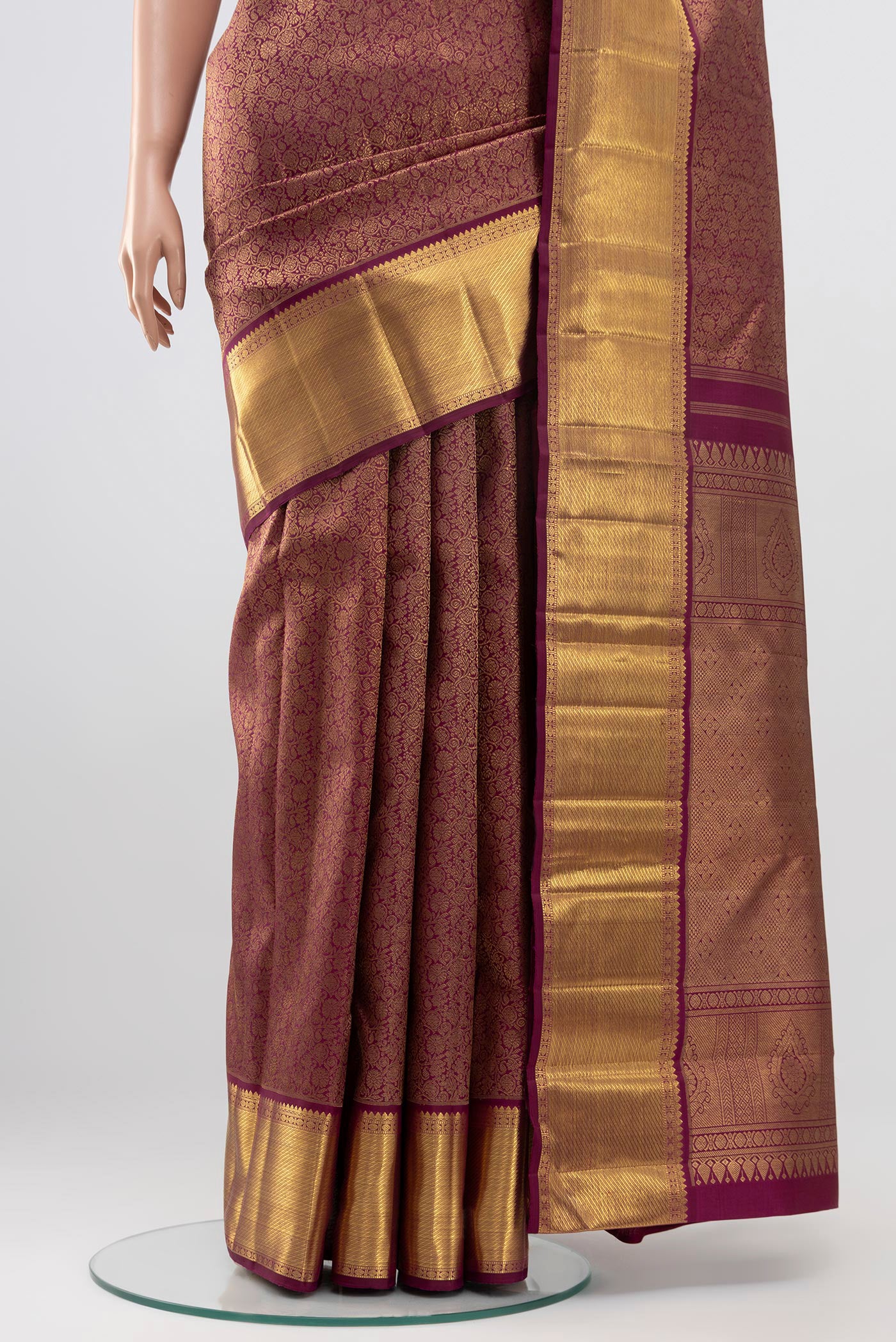 Pleats and pallu of Purple Kanchipuram Saree with Zari Brocade on the body and Zari Border. 