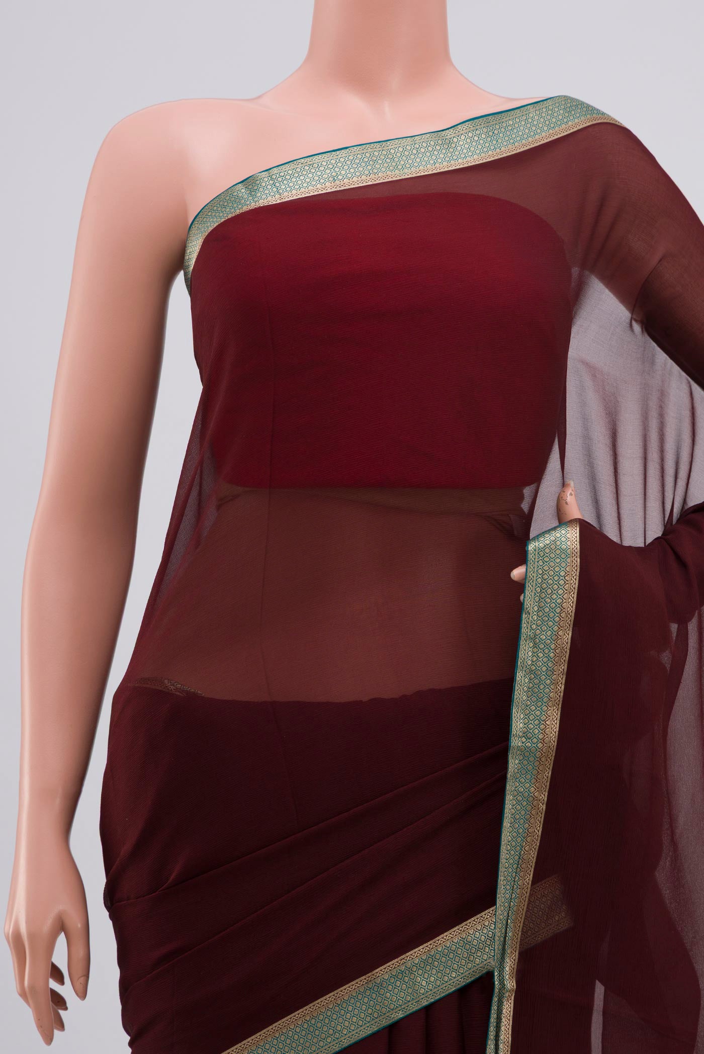 Border image of Brown Chiffon Saree with Plain Body and Zari Border. 