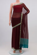 Brown Chiffon Saree with Plain Body and Zari Border.  displayed on a mannequin