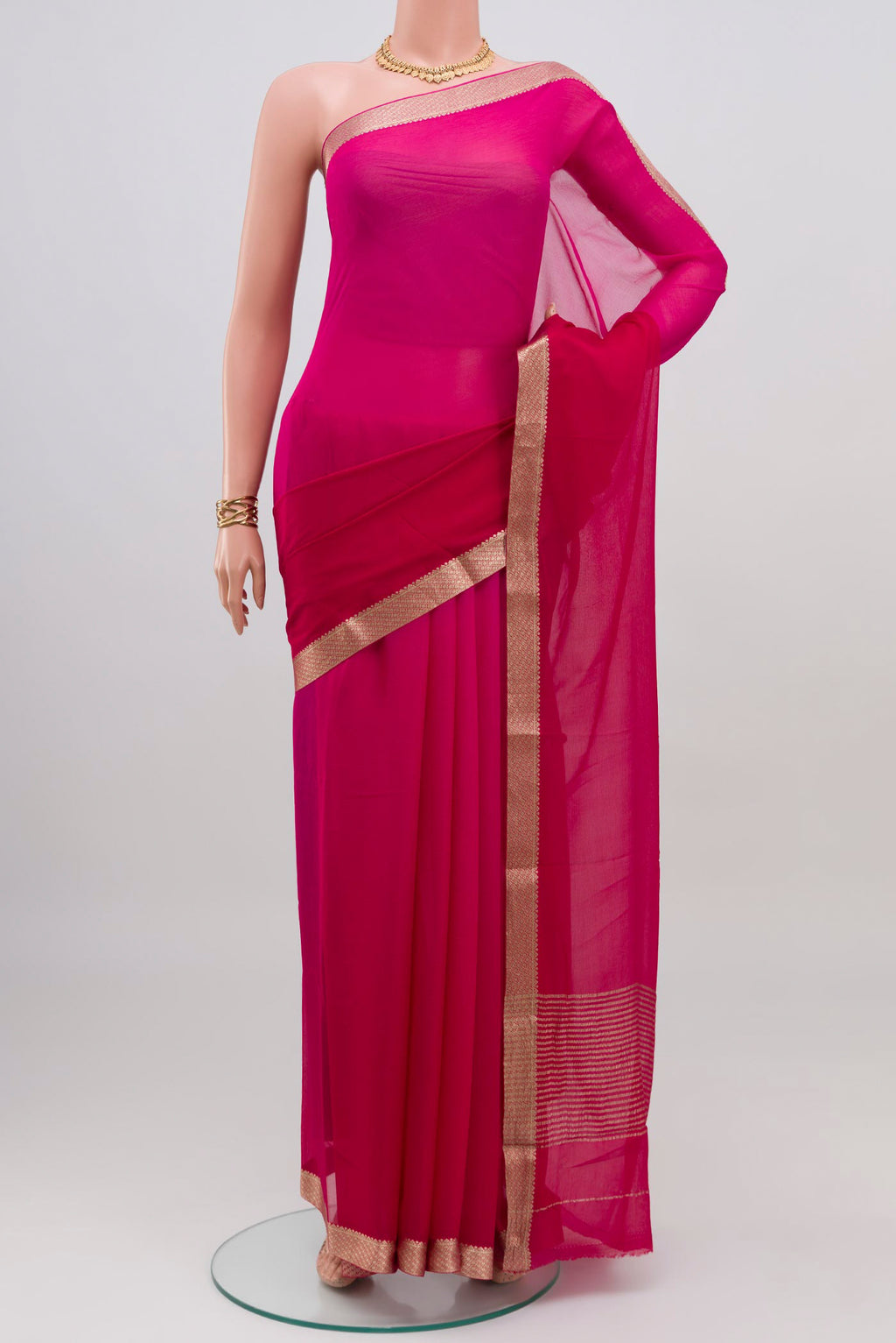 Pink Mysore Chiffon Saree with Plain Body and Zari Border.  displayed on a mannequin