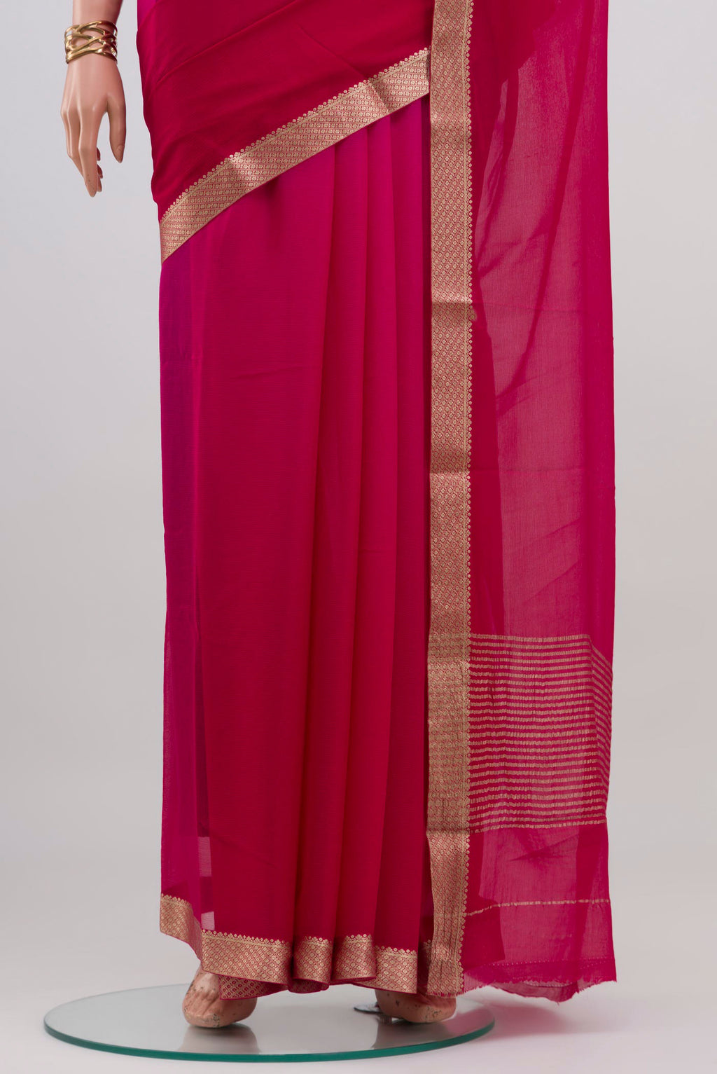 Pleats and pallu of Pink Mysore Chiffon Saree with Plain Body and Zari Border. 