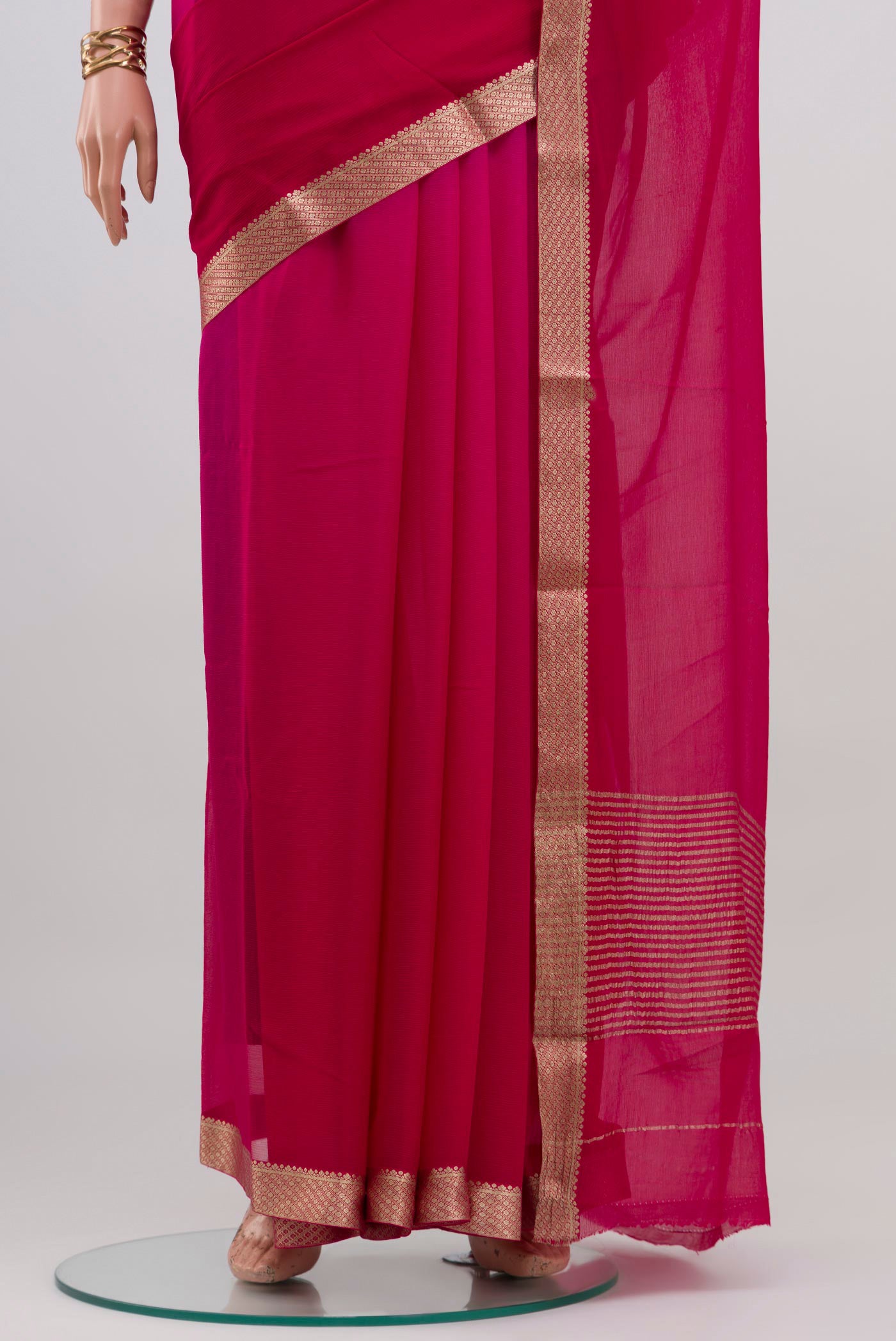 Pleats and pallu of Pink Mysore Chiffon Saree with Plain Body and Zari Border. 