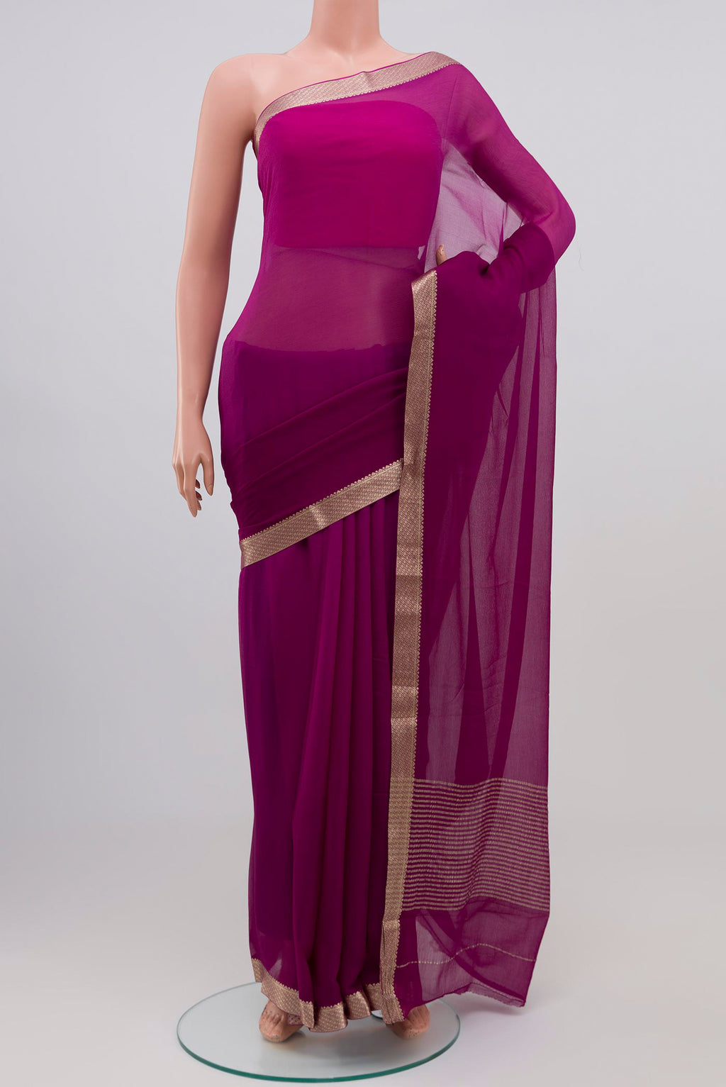 Purple Chiffon Saree with Plain Body and Zari Border.  displayed on a mannequin
