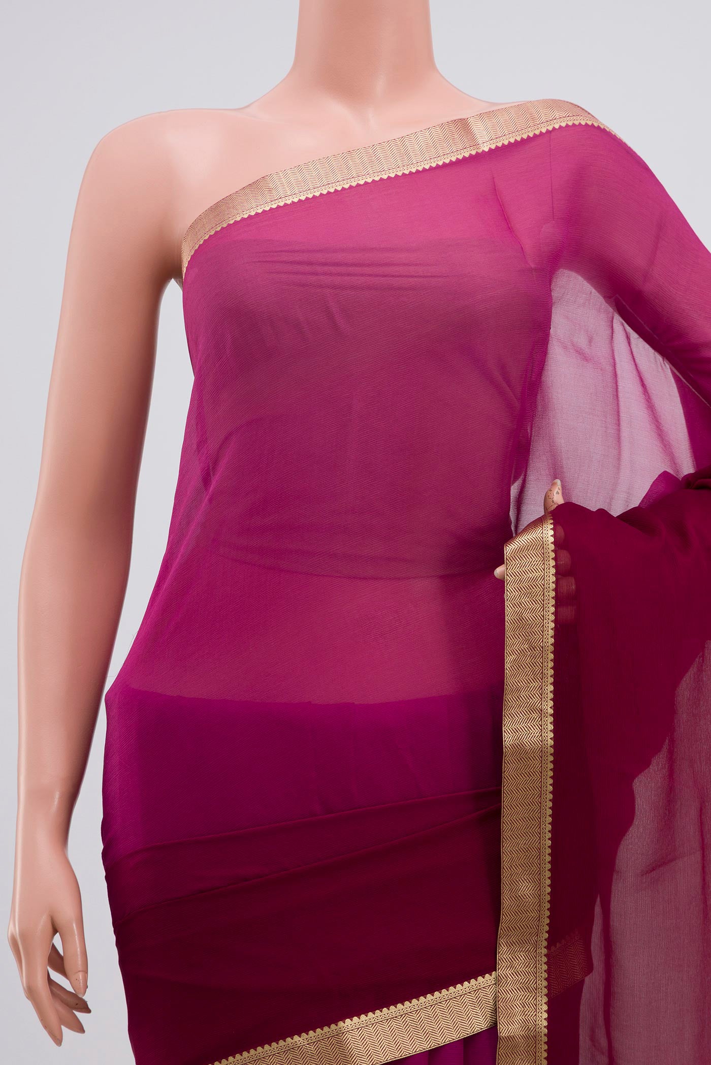 Border image of Magenta Chiffon Saree with Fancy on the body and Zari Border. 