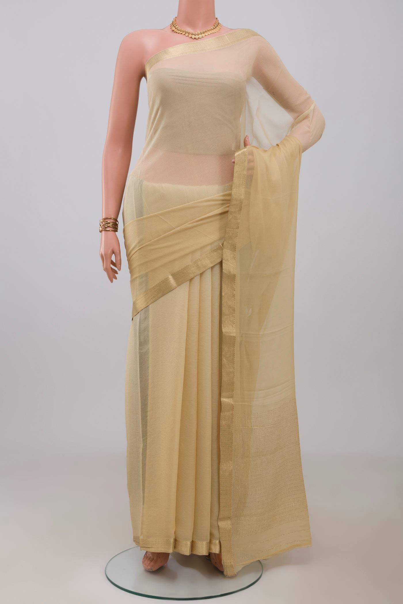 Multi Color Mysore Chiffon Saree with Ombre design on the body and Zari Border.  displayed on a mannequin