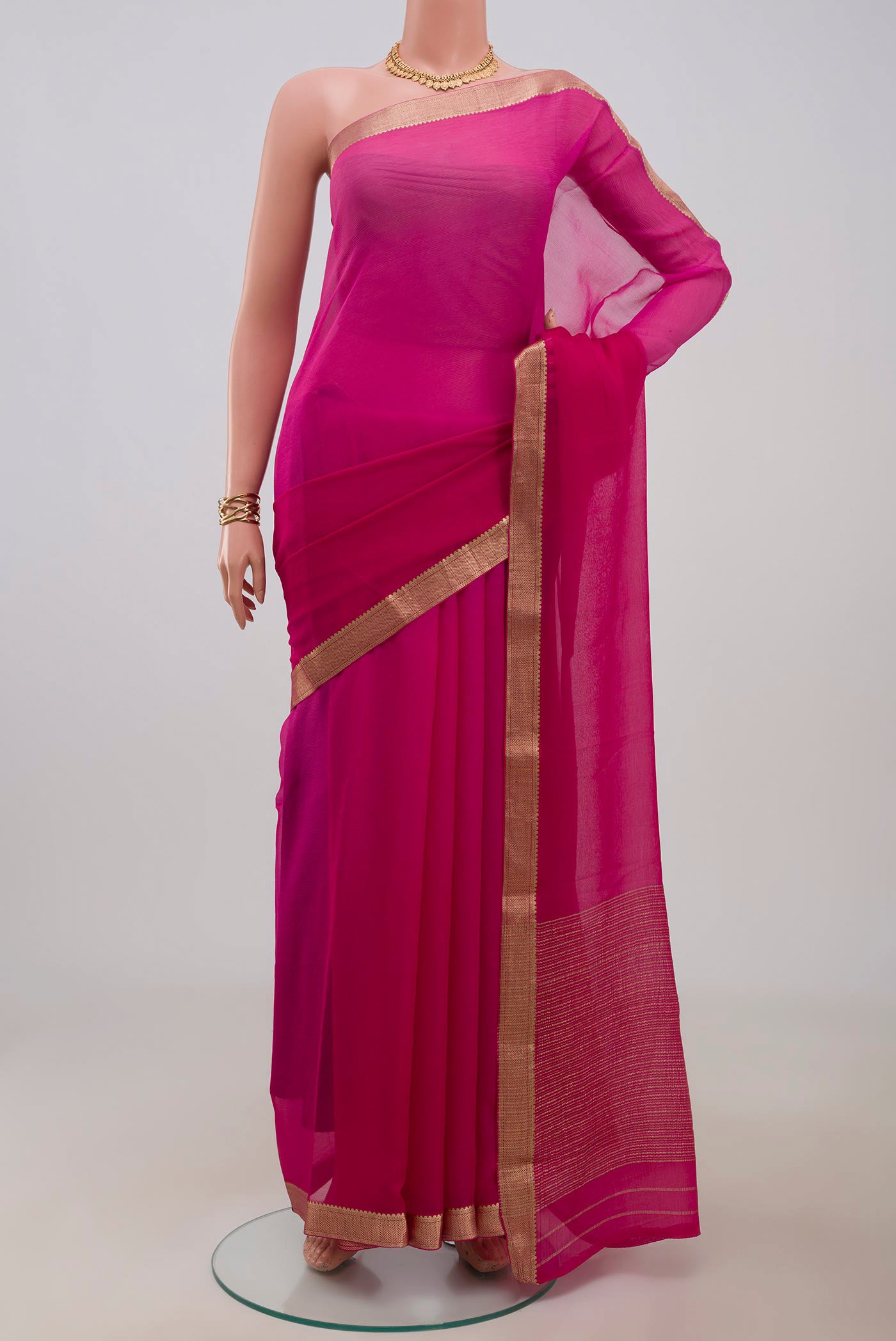 Multi Color Mysore Chiffon Saree with Ombre design on the body and Zari Border.  displayed on a mannequin