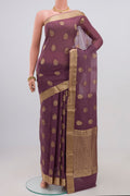 Lavender Georgette Saree with Fancy on the body and Zari Border.  displayed on a mannequin