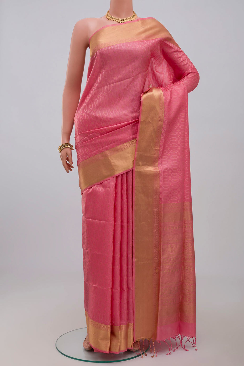 Pink Soft Silk Saree with Jacquard With Zari Butta on the body and Zari Border.  displayed on a mannequin