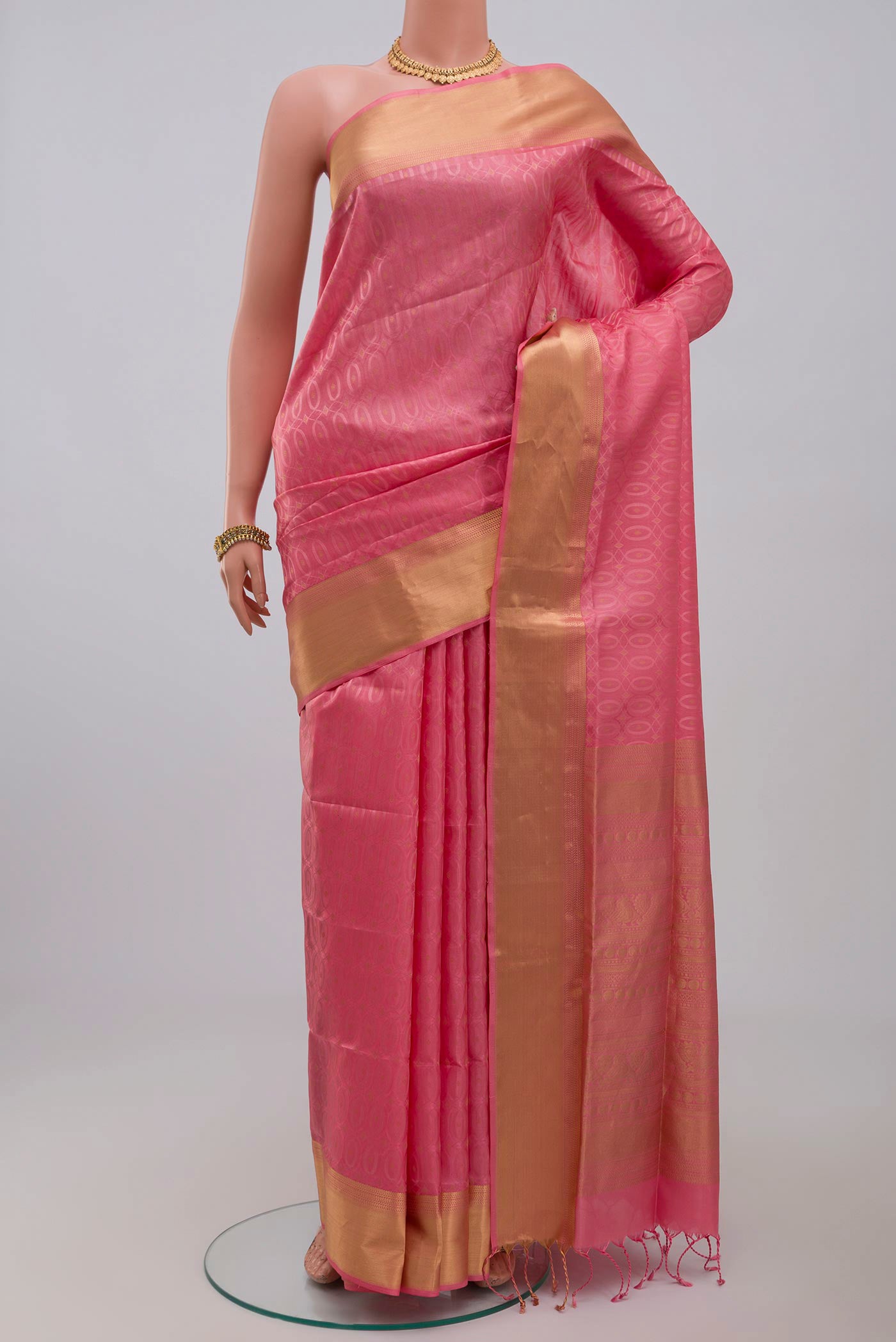Pink Soft Silk Saree with Jacquard With Zari Butta on the body and Zari Border.  displayed on a mannequin