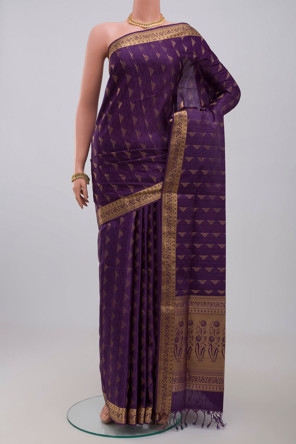 Purple Soft Silk Saree with Jacquard design on the body and Zari Border.  displayed on a mannequin