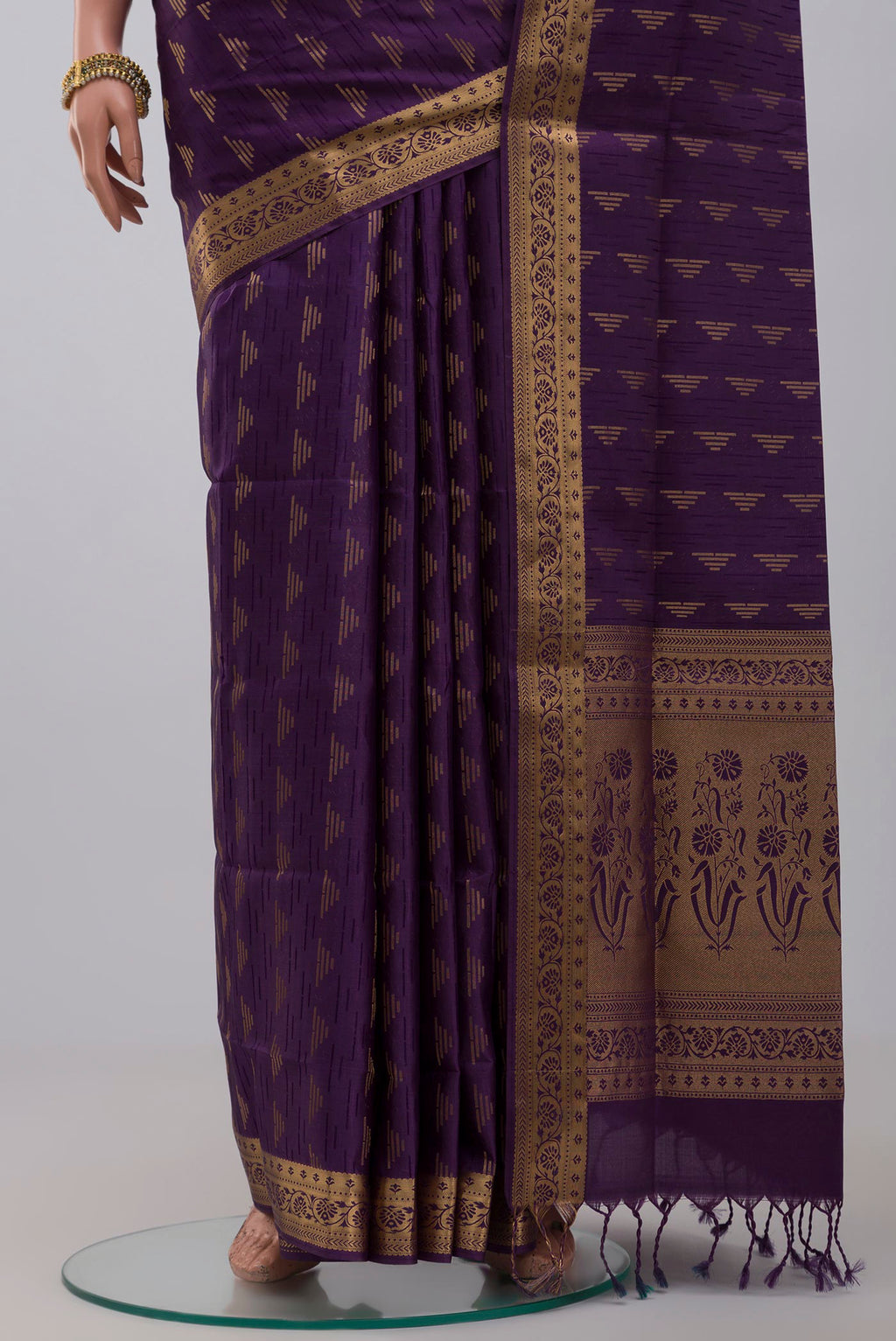 Pleats and pallu of Purple Soft Silk Saree with Jacquard design on the body and Zari Border. 