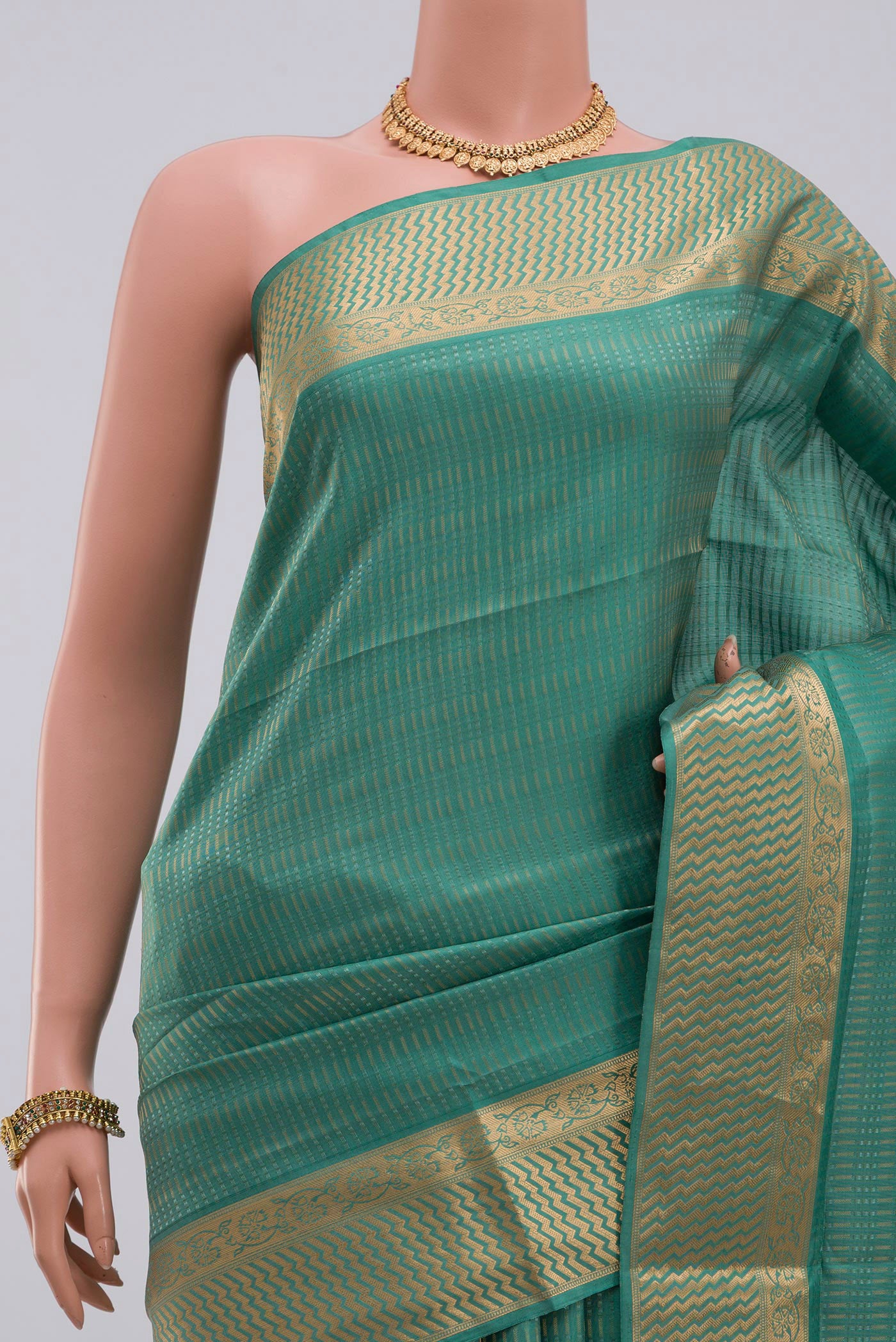 Border image of Green Soft Silk Saree with Jacquard design on the body and Zari Border. 