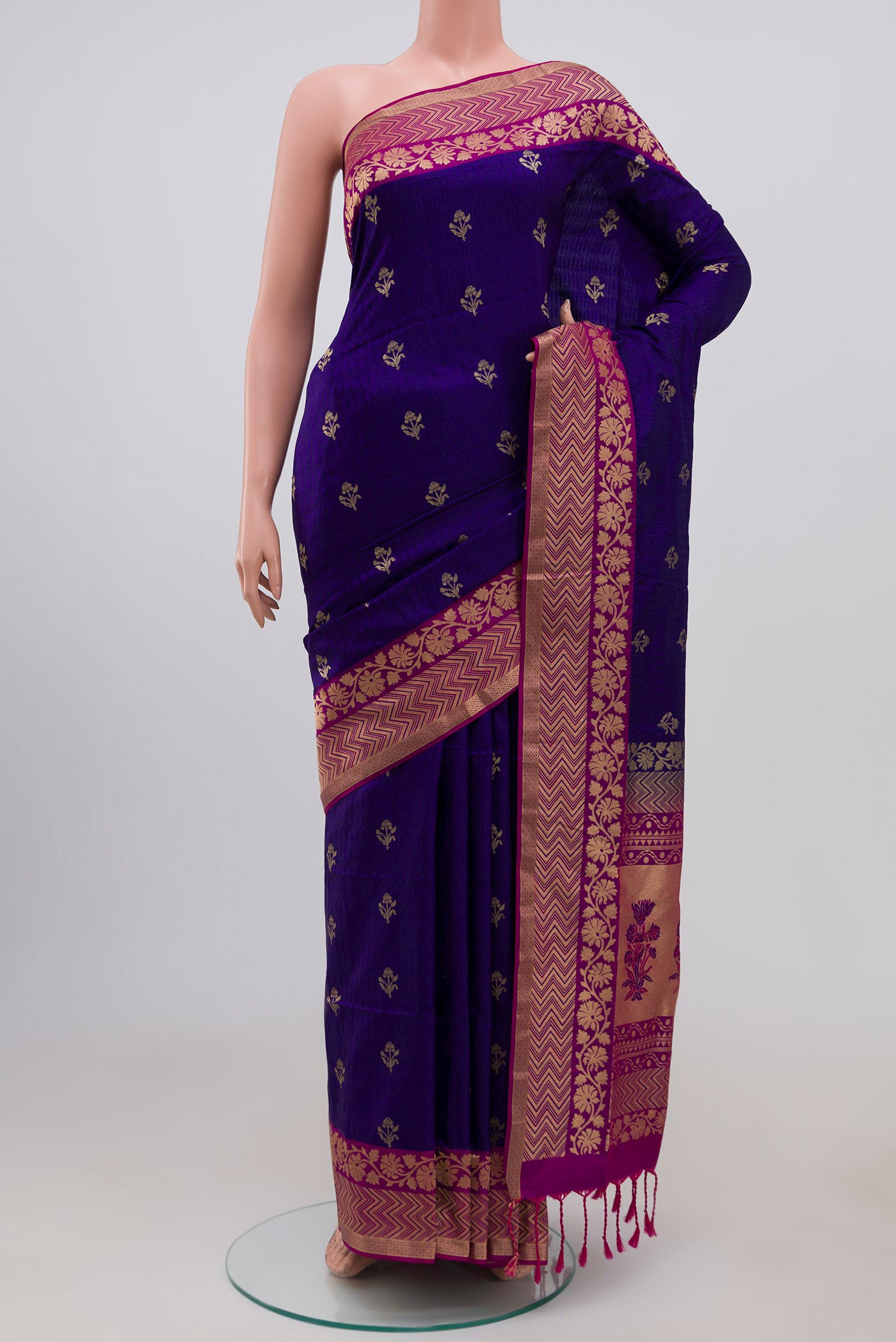 Blue Soft Silk Saree with Jacquard With Zari Butta on the body and Fancy Border.  displayed on a mannequin