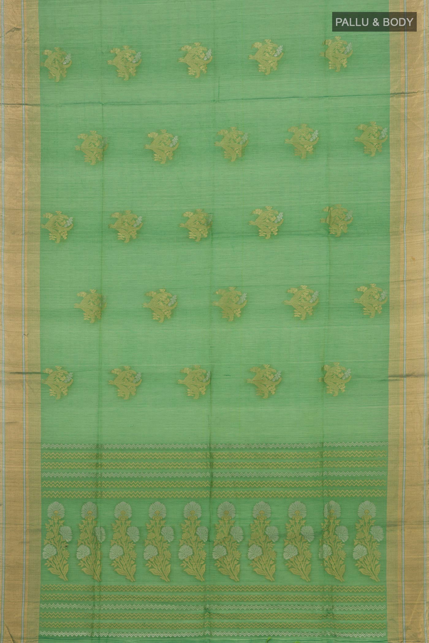 Flat view of Green Silk Cotton Saree with Zari Butta on the body and Thin Zari Line. 