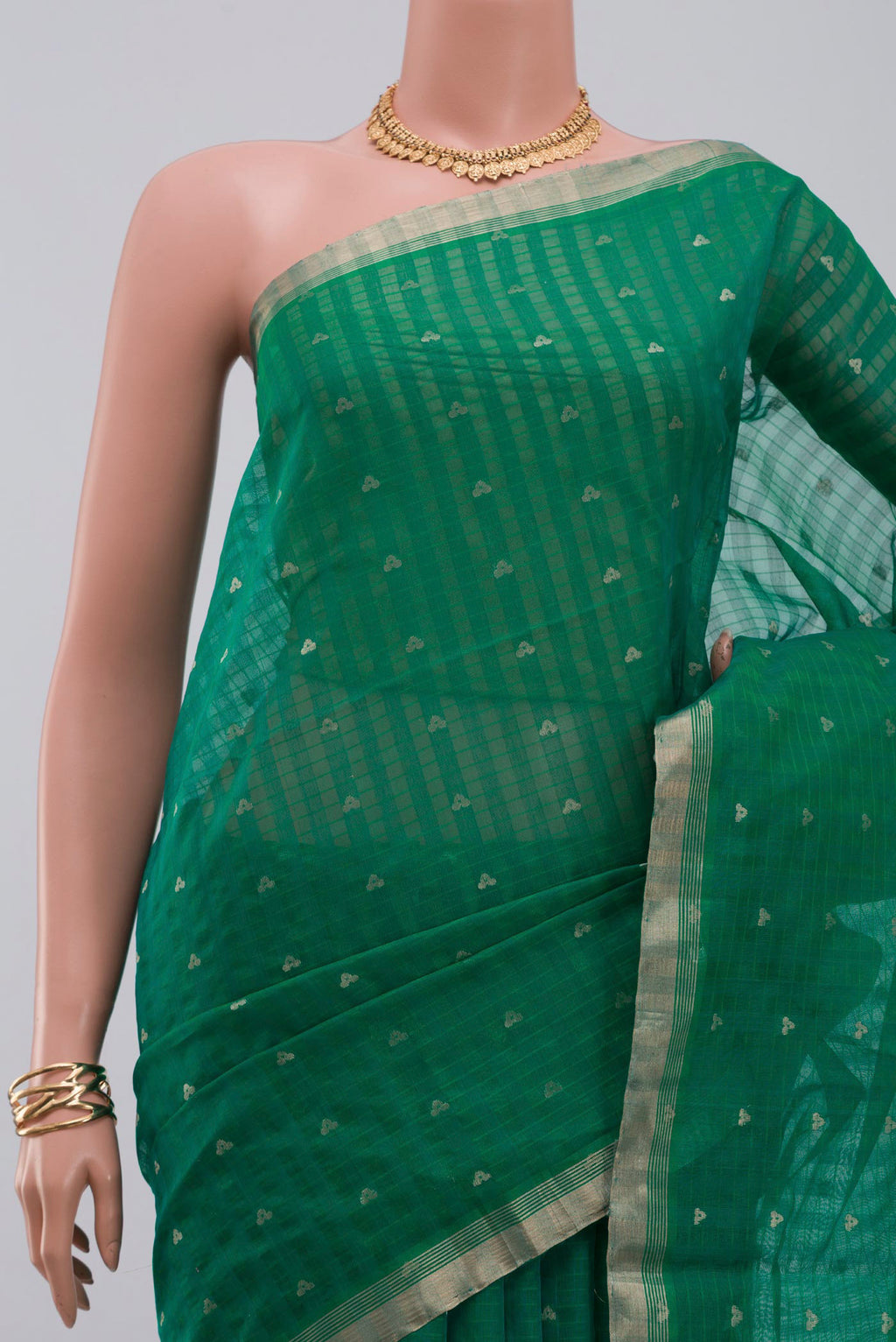 Border image of Green Silk Cotton Saree with Zari Butta on the body and Thin Zari Line. 