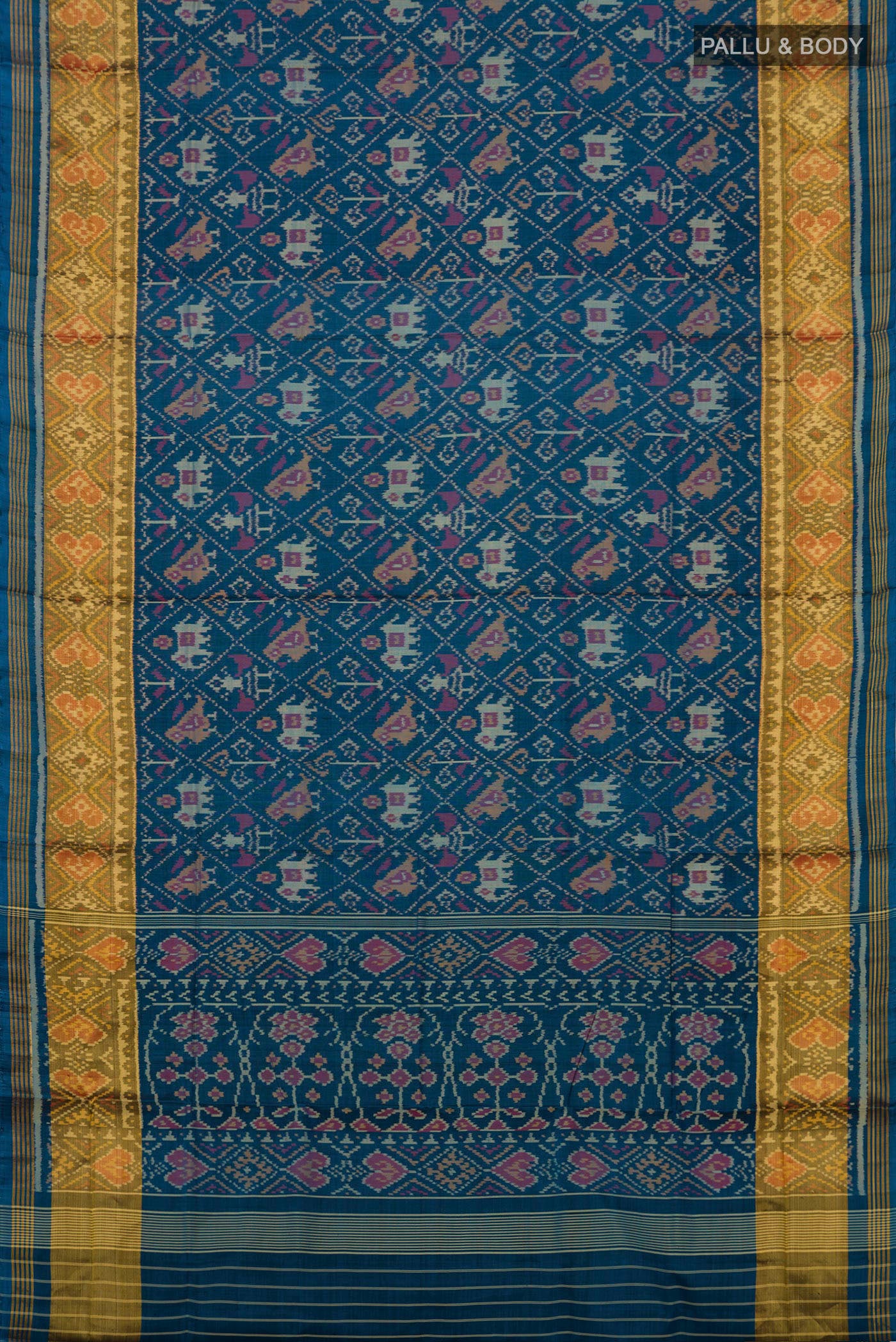 Flat view of Maya Blue Rajkot Patola Silk Saree with Ikat design on the body and Zari Border. 