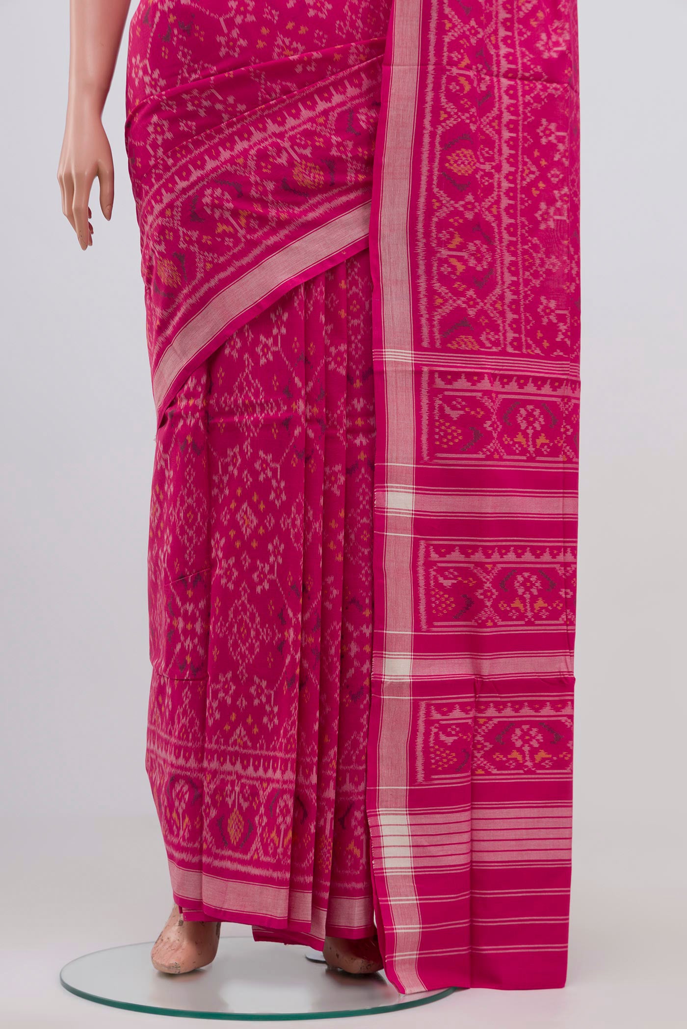 Pleats and pallu of Pink Pochampally Silk Saree with Ikat Print on the body and Ikat Border. 